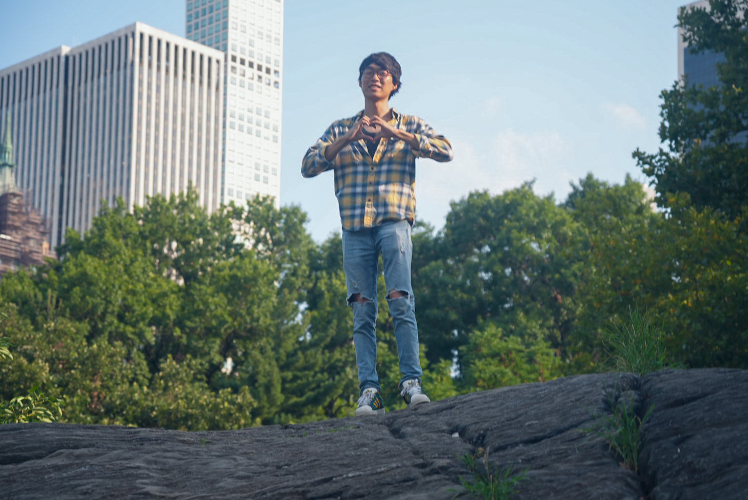 James Pilsung looking up at a christmas tree